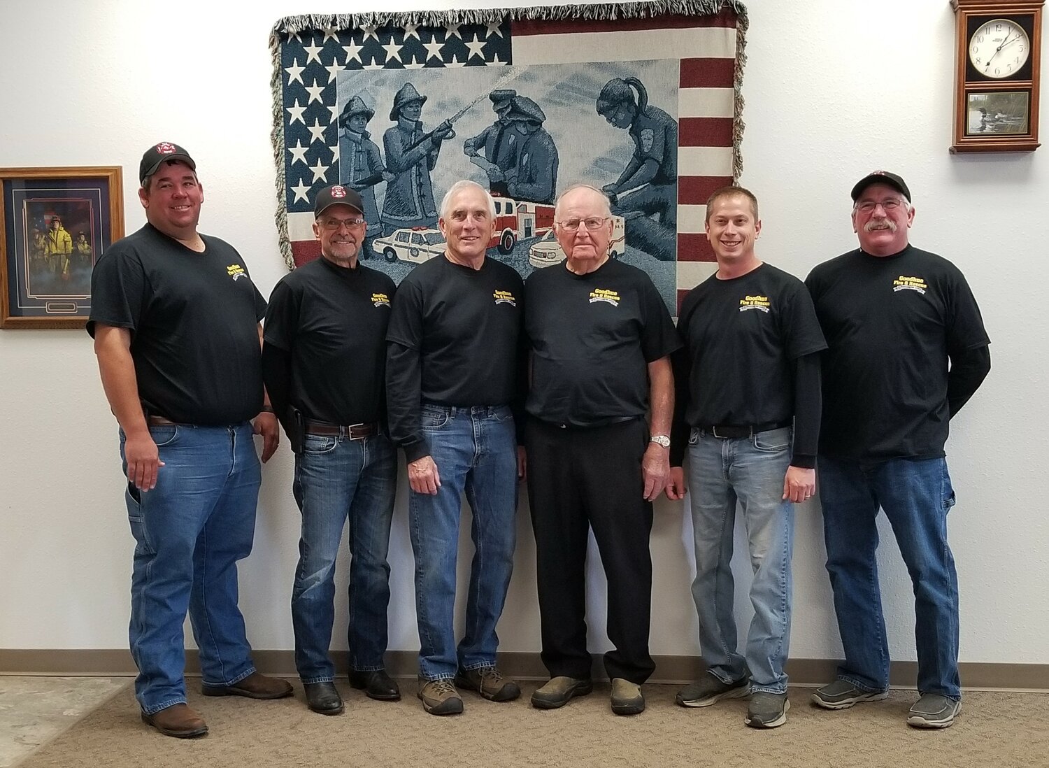 Current Goodhue Fire Department chief, Derek Weckerling stands with former chiefs, Chip Krueger, Al Lodermeier, Elroy Rusch, Dustin Luhman and Mike Lodermeier at the fire hall on October 15, 2023 in observance of the 125th anniversary of the department's founding.