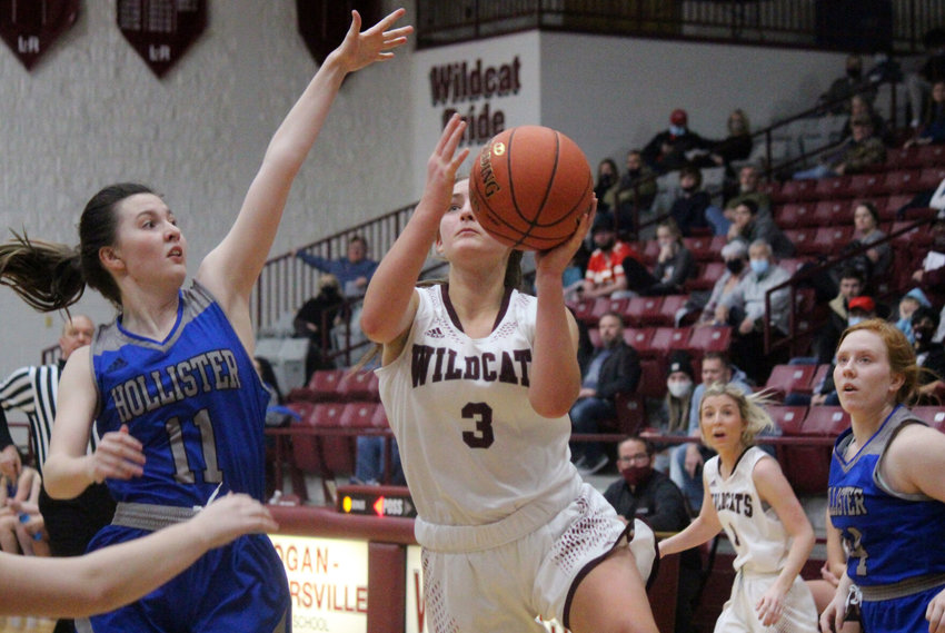 Logan-Rogersville junior Gracie Kibby goes up with her left hand in traffic in the second half of Monday&rsquo;s contest against Hollister.