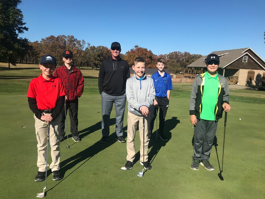 Wise with his junior golf students.