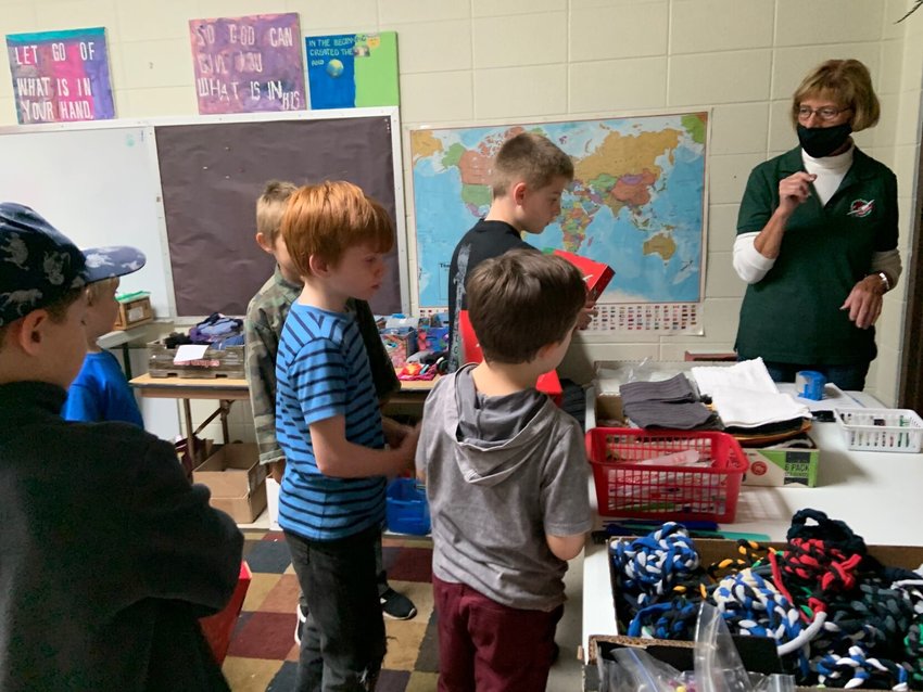 On Wednesday, the RA and GA children's groups at Marshfield First Baptist Church helped fill shoeboxes for Operation Christmas Child, in preparation for National Collection Week Nov. 16-23.