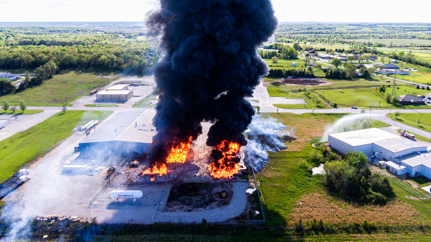 About 10,000 20-pound propane cylinders caught fire and exploded outside of the Kosan Crisplant on Thursday, May 13.
