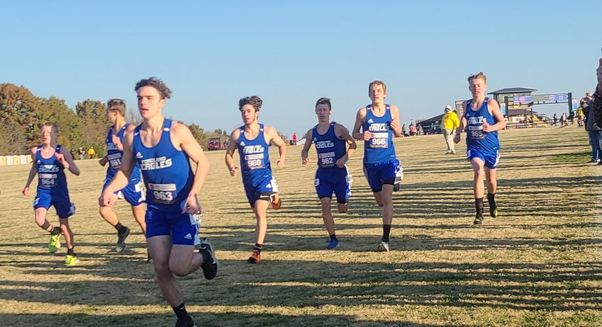 Fordland boys cross country team competing in the state tournament. The boys team ended with a total time of 1:35:37.