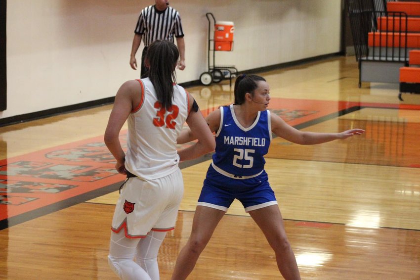 Marshfield Lady Jay Aluara Padgett guarding her opponent during the game against Waynesville.
