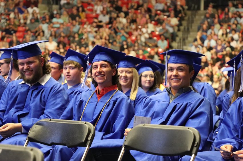 Students from the MHS Graduating Class of 2022 listen with smiles and laughter to the various addressing throughout the evening.