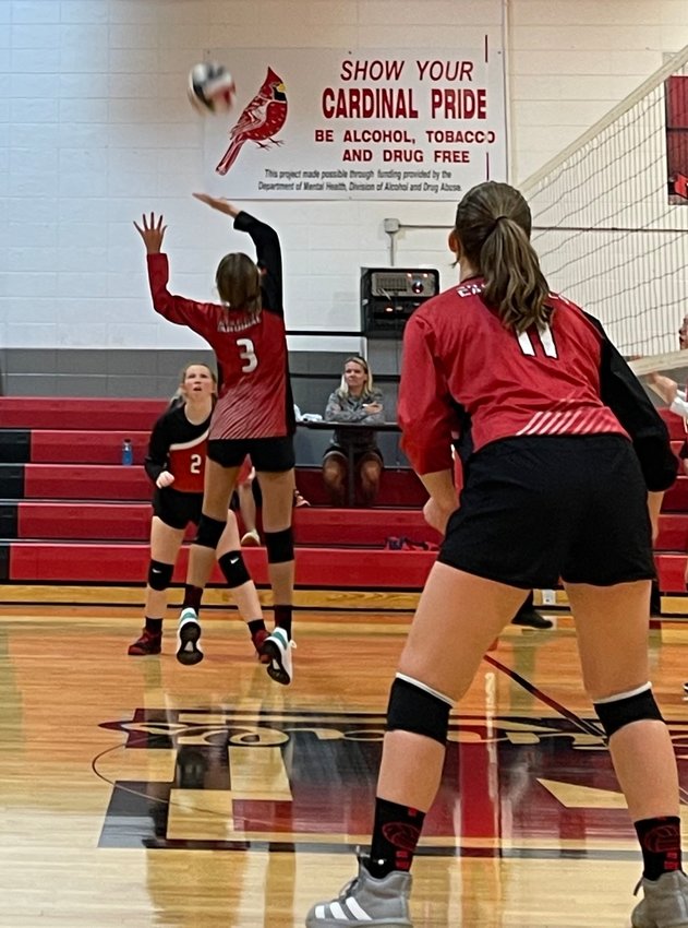 The lady cardinals set up for a spike during the game against Chadwick September 6.