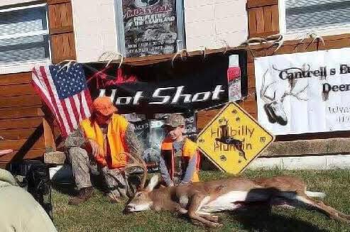 Noah, age 6 in the photo-now age 10, shown with his grandpa after shooting his buck. Noah shot the biggest deer that year and had the honor of riding in the Marshfield Fourth of July parade with the Hillbilly Huntin&rsquo; team. Hunting reconnected Noah&rsquo;s family. &ldquo;&hellip;we&rsquo;ve made life long friends with this little kid&hellip;&rdquo; shared Frazier.