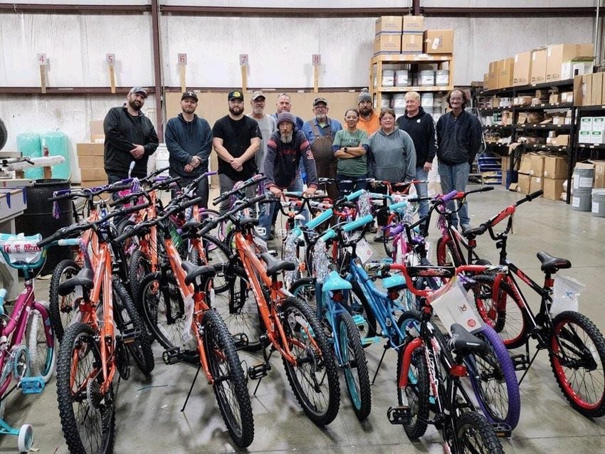 &quot;15 of our workers stayed late making sure every tire was inflated on the bikes,&quot; told COO of Mid AM Metal Forming, Justin Hastings. Mid AM Metal Forming gave away a total of 83 bikes to Fordland and Logan-Rogersville schools.&nbsp;   Contributed Photo by Care to Learn Fordland.