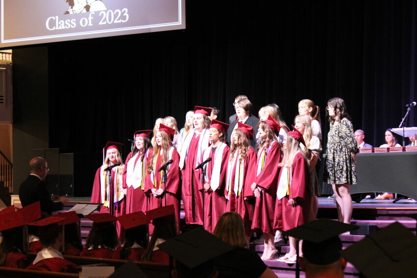 Singing &quot;You Can't Make Old Friends&quot; is the Strafford Chamber Choir under the direction of Zachary Chittenden during Strafford's Commencement Ceremony on May 18.   Mail Photos by J.T. Jones
