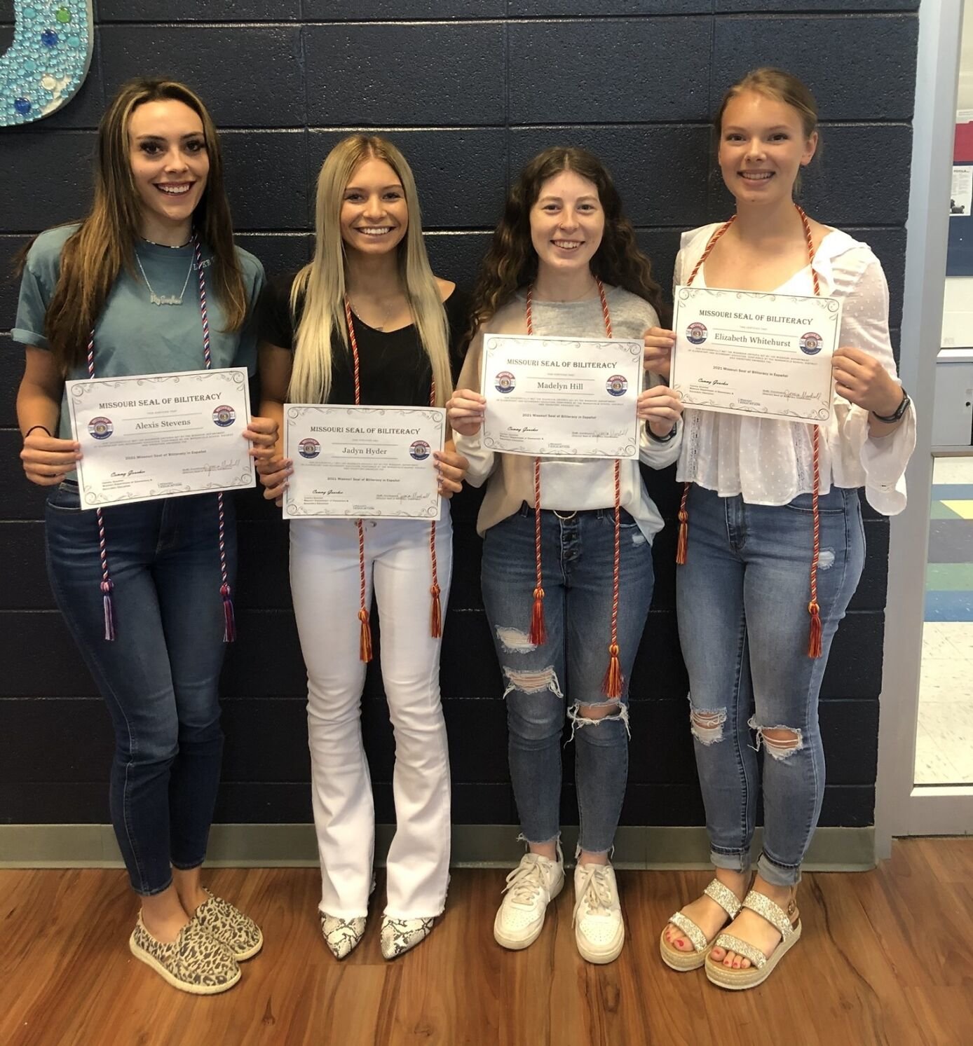 Pictured left to right: Alexis Stevens, Jadyn Hyder, Madelyn Hill and Betsy Whitehurst. These 2021 grads received awards for their scores on this years AAPPL exam.