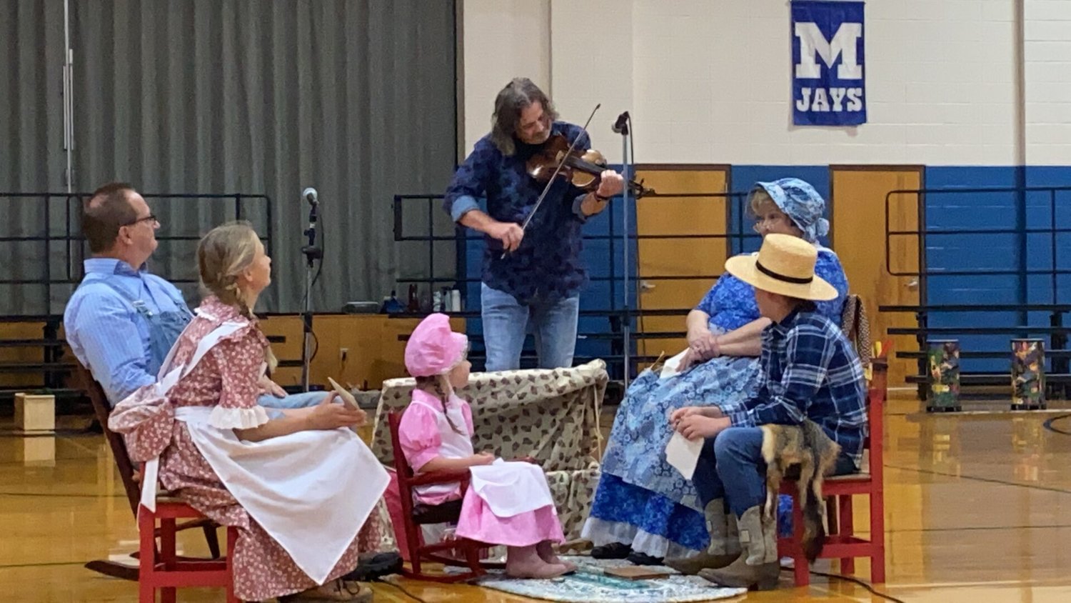 Justin David set the tone for the Pioneer Day program by playing his fiddle to start it off. David first performed for the Pioneer Day crowd at the inaugural event in May of ’91 as a Marshfield High School junior.