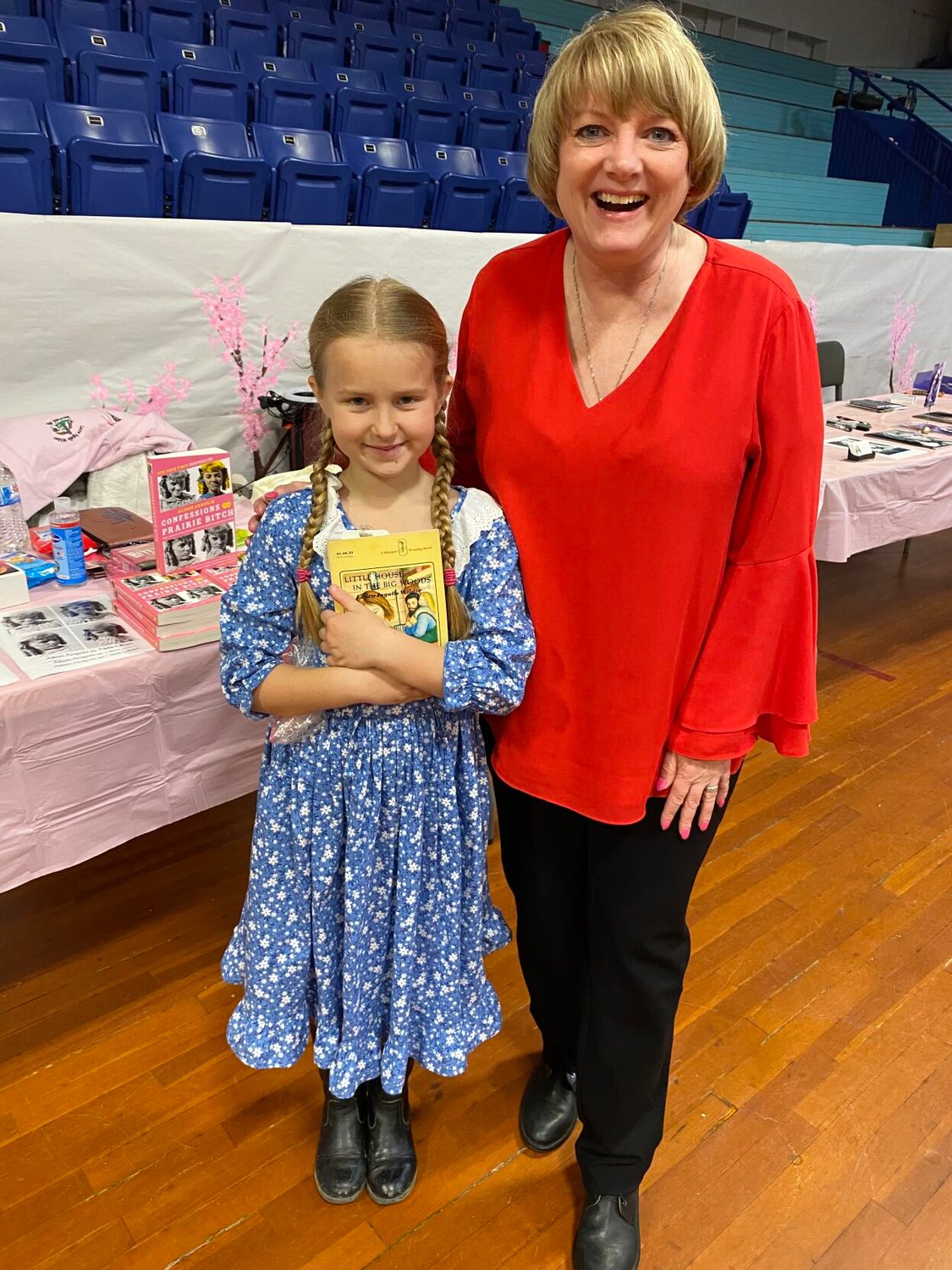 Marshfield third-grader Breanna Wheeler dressed for the occasion as she met Nellie Oleson from NBC’s Little House on the Prairie at the Nostalgia Fest Autograph Show. The event was held at the Marshfield Community Center as part of a string of festivities slotted for the Missouri Cherry Blossom Festival in Marshfield this past week. 