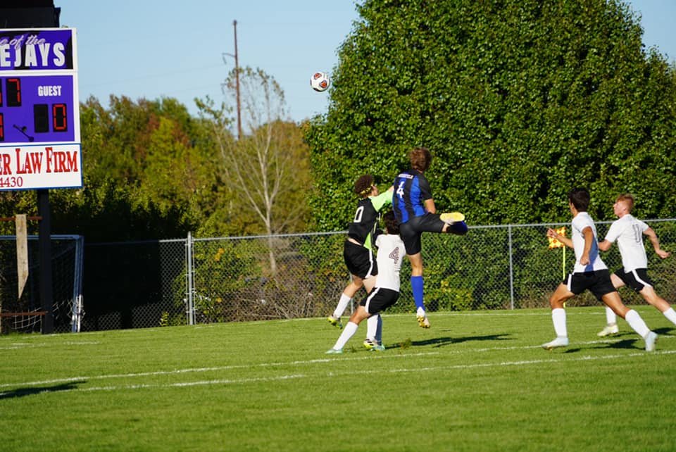 Jay's junior Joe Harles faces off with Crocker’s goalie gaining some serious air.