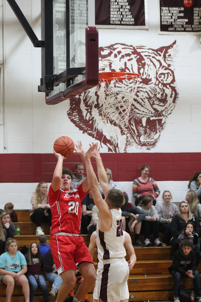 Sophomore Ethan Scheetz goes up to the hoop for Niangua. Scheetz scored 17 points for Niangua in the game against Seymour.