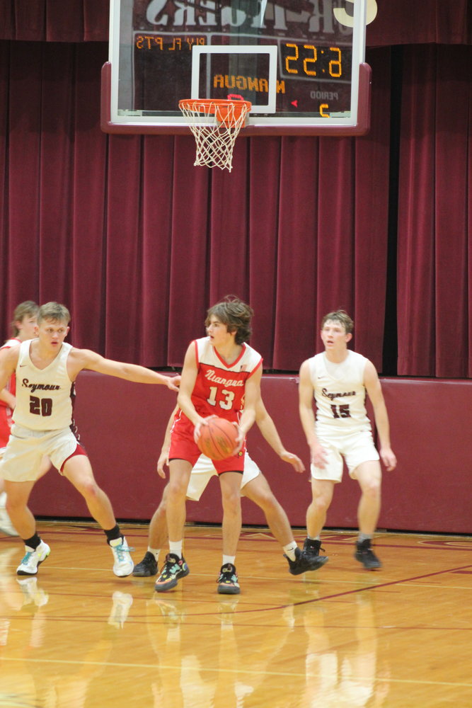 Sophomore Evan Kochs made 5 defensive rebounds for the Cardinals in the game against Seymour.