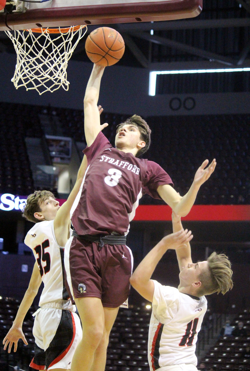 AK Rael looks to throw it down in the second half of the win over Ash Grove at JQH Arena during the 2020 tournament.