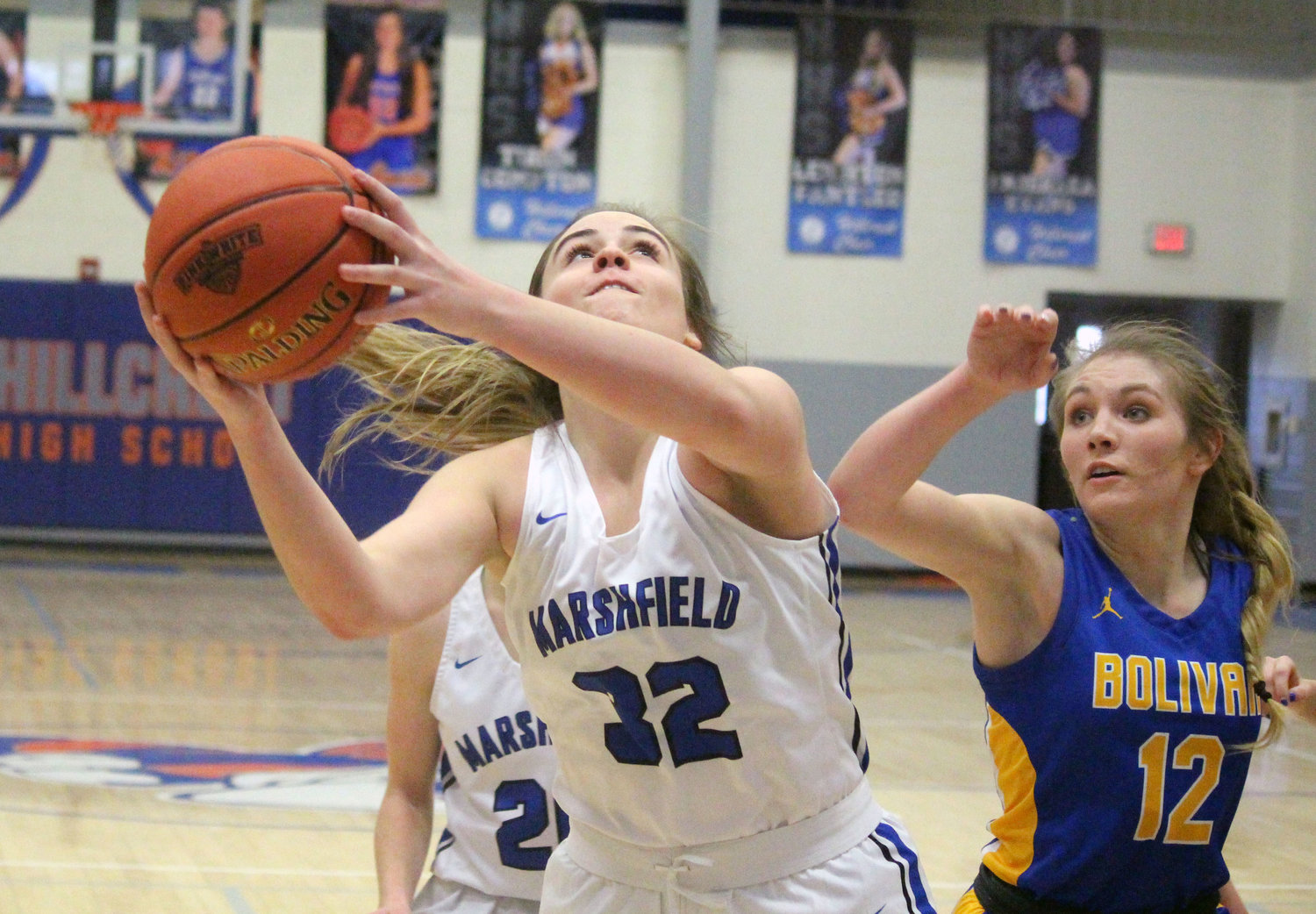Marshfield’s former player Maile Peck attempts a short-range basket in the second half of the defeat to Bolivar during the 2020 tournament.