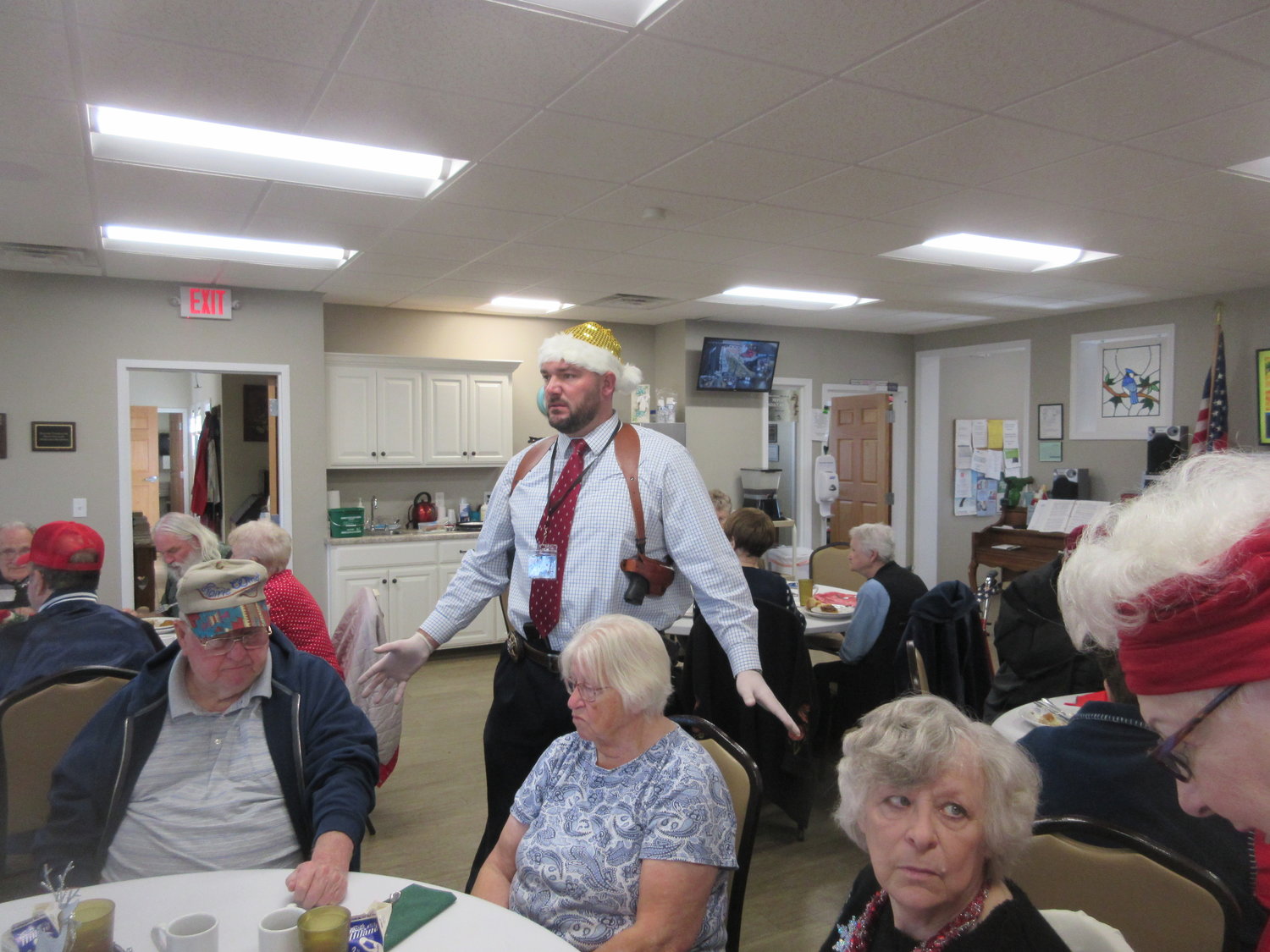  Sheriff Roye Cole volunteers to serve a meal at the Marshfield Senior Center ahead of the holidays.
