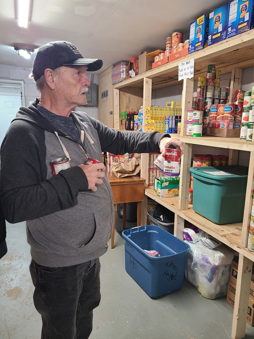 Terry Bales of Rogersville volunteers weekly at Safe Haven Now. Bales spends his time organizing canned goods amongst other dutiful tasks for the organization.