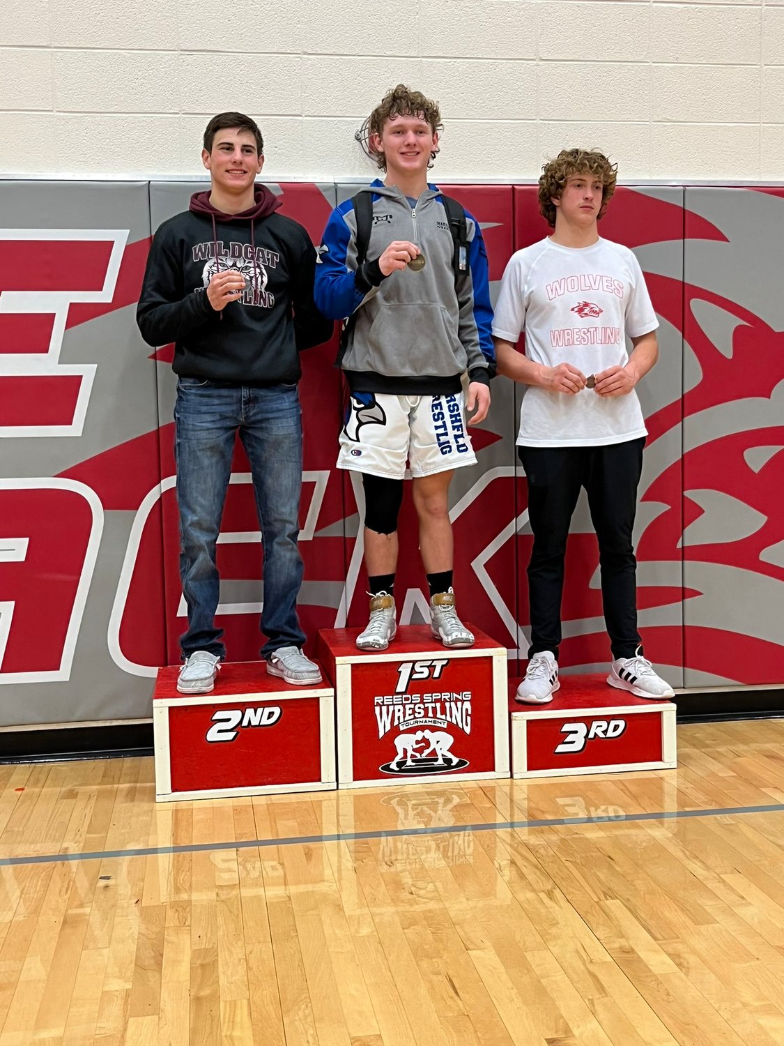 Kit Farran, for Rogersville taking the podium after his win in his weight class. Farran earned 2nd team honors at the tournament.