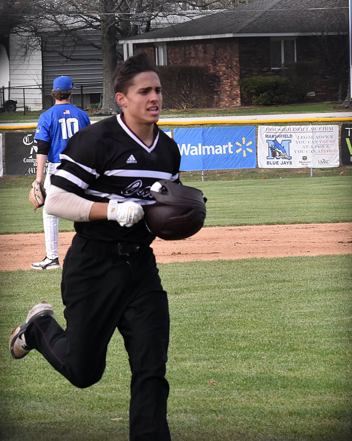 Junior Wildcat catcher Noah Carrow trots home after stroking a second-inning solo home run to start the Rogersville scoring. Carrow also took the mound in the seventh inning to close out the Wildcat shutout win.
