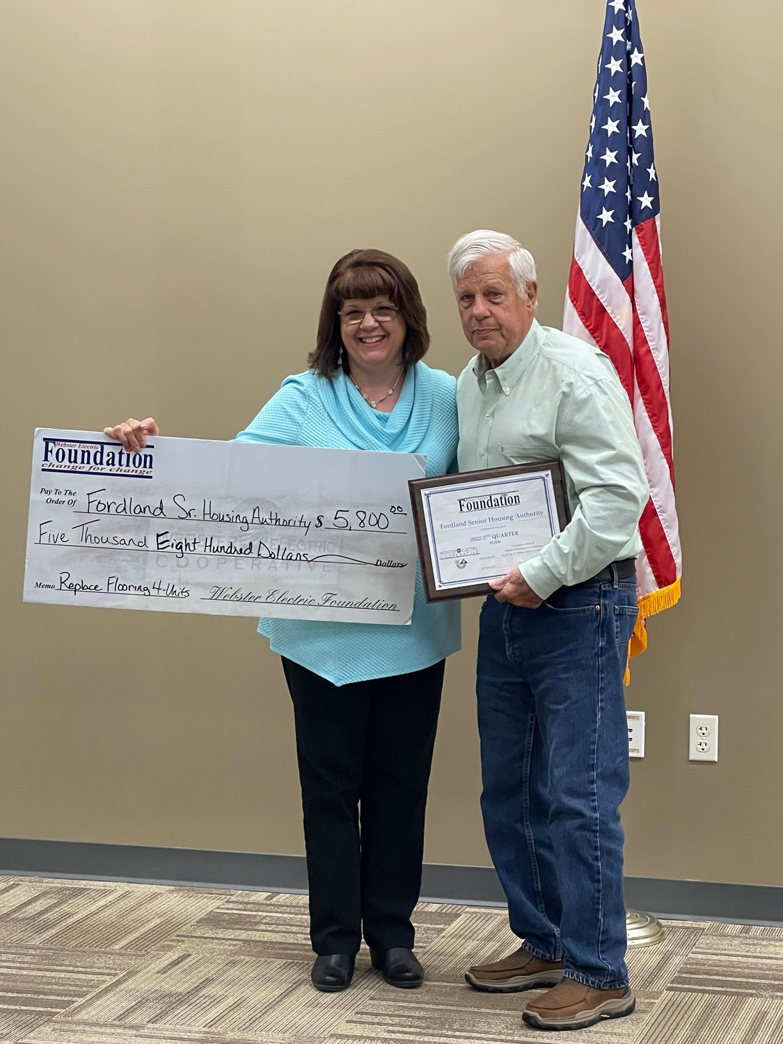 Administrator of the Fordland Senior Housing Authority accepts the grant award in the amount of $5,800. They have plans to use the award money for new flooring in four of the apartments.