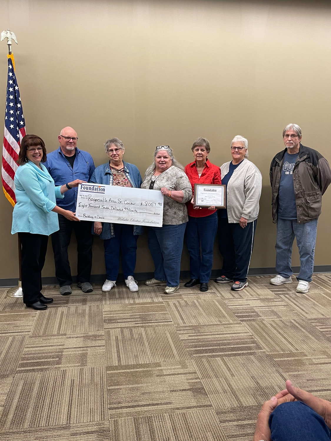 Rogersville Area Senior Center board members accept their award in the amount of $8,007.95. They plan to purchase a building to organize their medical equipment to make it easier to find when needed.