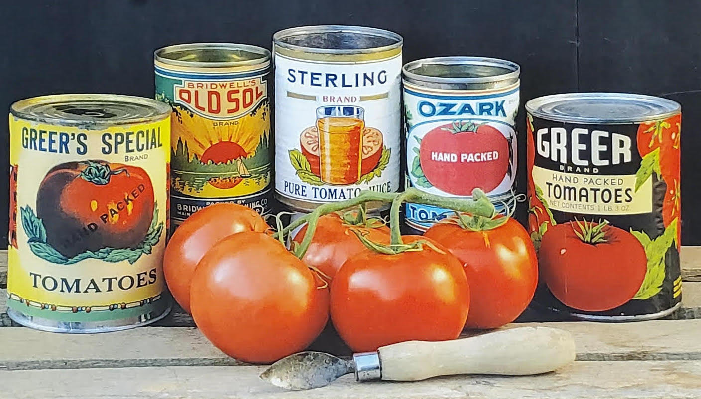 The colorful cover pays tribute to the tomato canning industry in Webster County and features some of the labeled cans so prominent at that time.