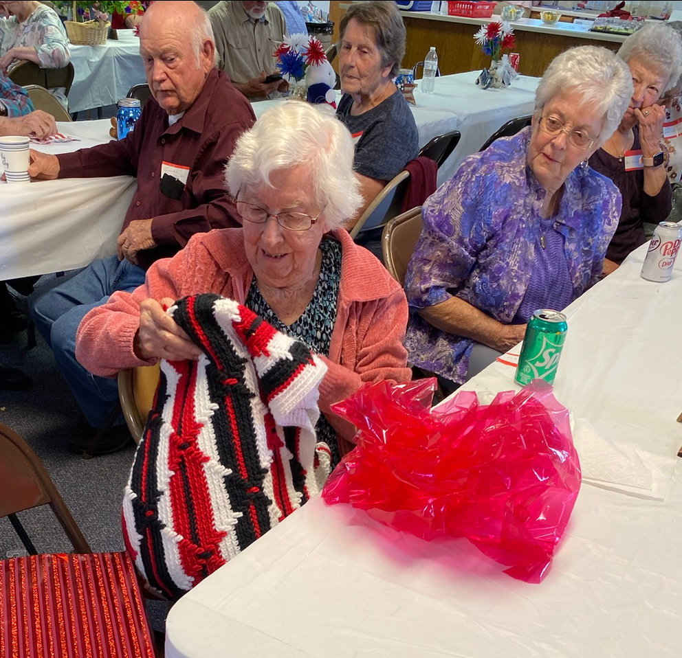 The oldest graduate, Slyvia Snodgrass, 97, graduated in 1948 and received an afghan blanked decorated with the Elkland school colors. The afghan was made by Evelyn Cunningham.
