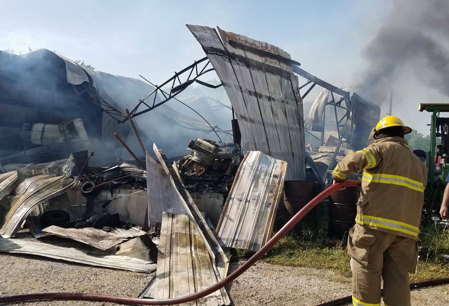 Elkland, Marshfield and Buffalo firefighters respond to a fire in Elkland, MO on June 16.
