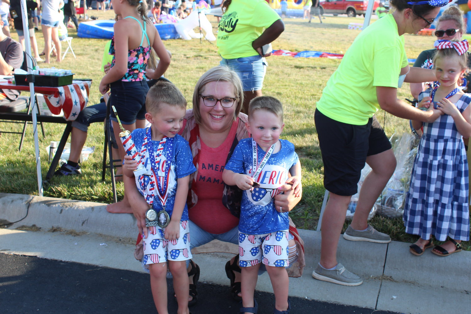 USA born and raised. A proud mom and her two Mr. Patriotic Winners form the Copper Rock Village Celebration.
