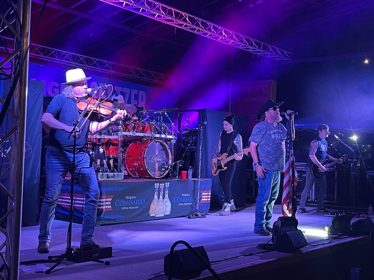 Justin David was first shot to fame through the tv show, Nashville Star, where he showcased his fiddle, mandolin and vocal skills. David is pictured left, performing alongside Colt Ford.