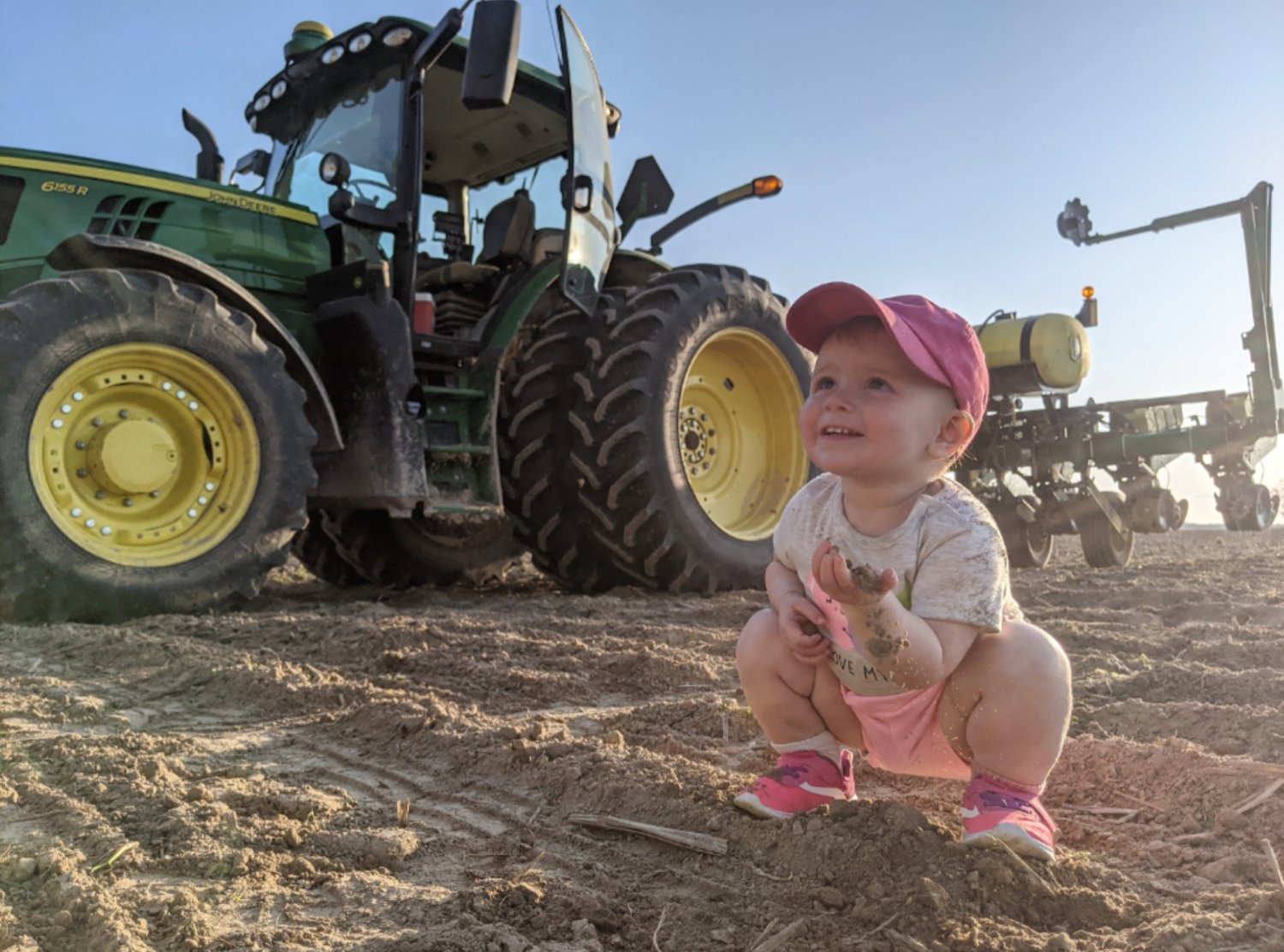 “Ready for Seed” wins Honorable Mention in the Faces of the Farm category of the Focus on Missouri Agriculture Photo contest hosted by the MO Dept. of Agriculture. Taken by Haley Scott at her farm north of Fordland, the photo features her daughter two and a half year old Clara.
