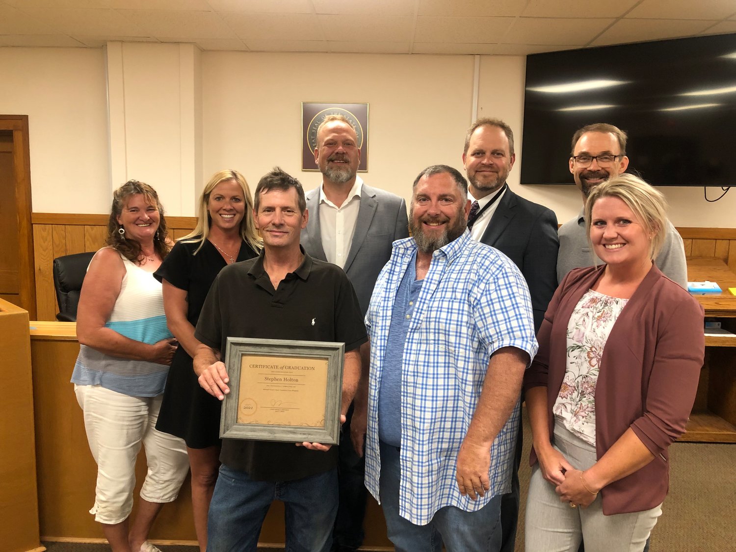 There are more than 4,800 participants currently enrolled in Drug Court in the State of Missouri, including 22,000 graduates. One of those graduates include Stephen Holton (holding frame) who graduated July 7 at the Webster County Courthouse.
