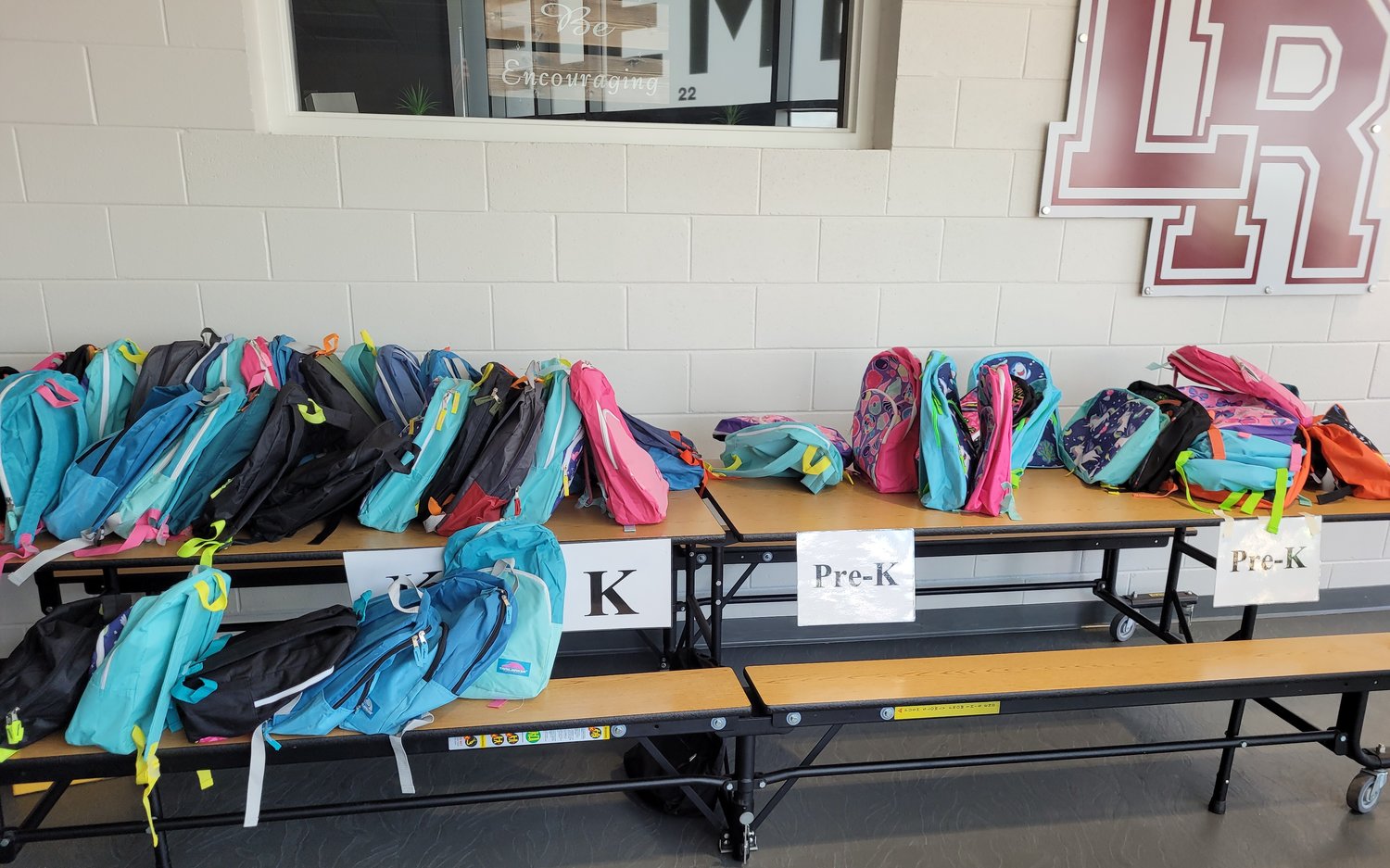 This photo shows just a few of the 590 backpacks prepared by all the churches. Masters says, "Any backpacks that are left over, they will be administered to each building aid and nurse for any one who moves into Rogersville throughout the school year and does not have the supplies they need. Then in December, we will replenish their supply at Christmas break."