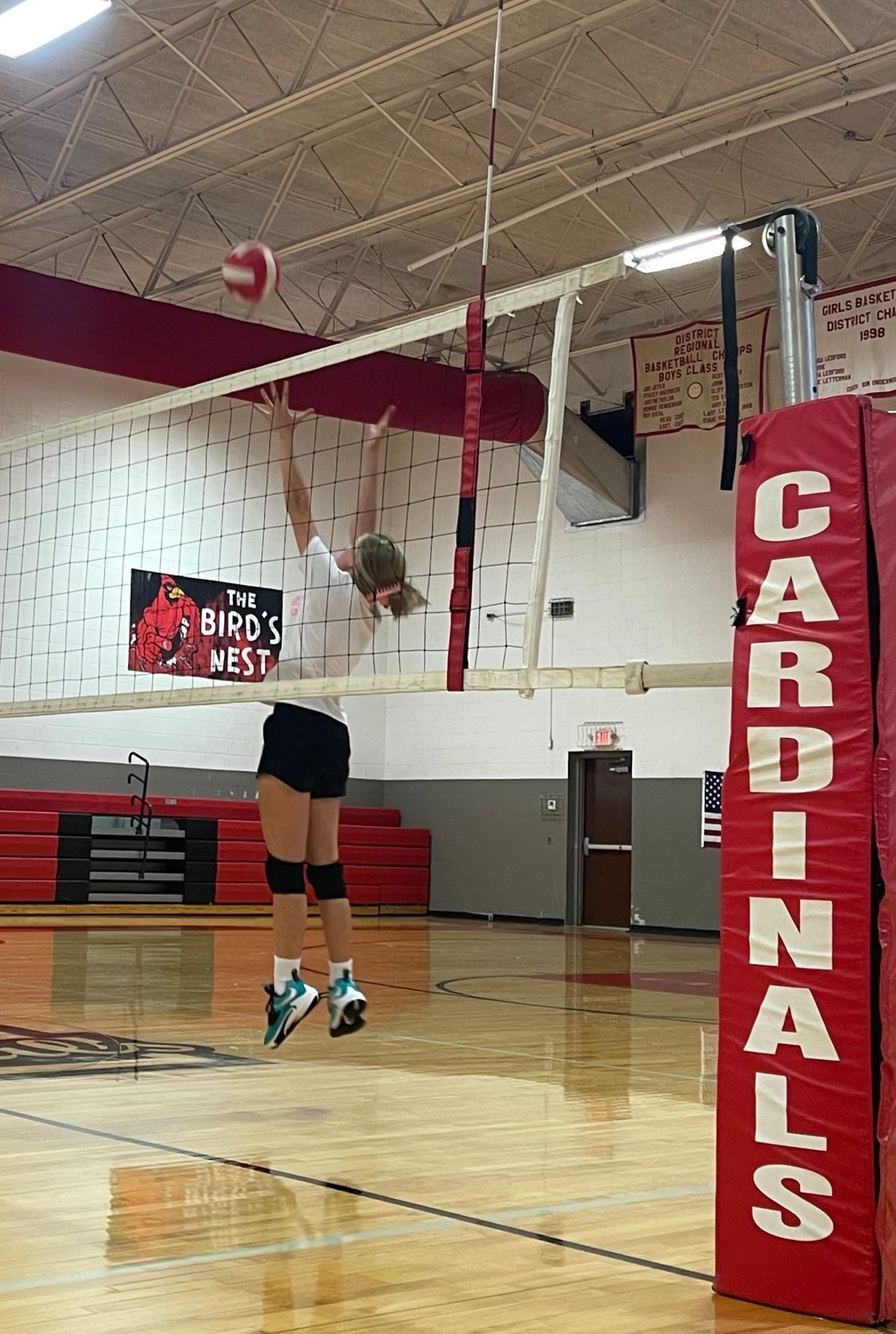 Ashleigh Vestal, freshman, works jumping drills during practice.