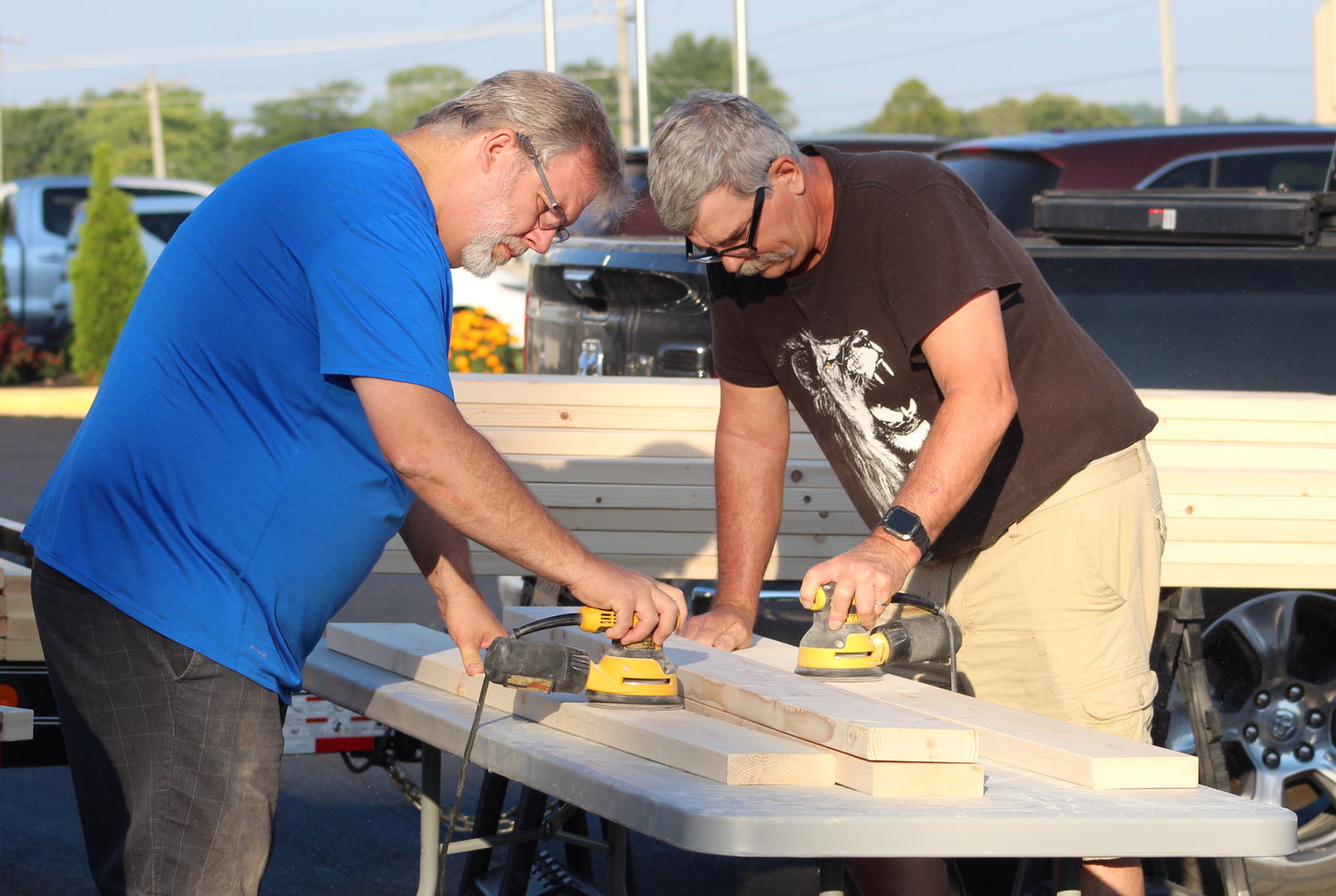 Former Mayor of Marshfield and Community Connections, Robert Williams, is seen with another volunteer sanding boards. Williams shares how he and others got involved with SHP, “ In March of 2021, after hearing about SHP a group of five guys (Alan Balmer, Terry Arndt, Tom Donovan, Carl Gore, and myself) decided to go to San Antonio to train and start a new chapter. Our Core Team is now almost 20 people who are very dedicated to the cause.”