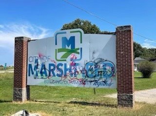 For the second time the city of Marshfield sign has been vandalized. “Marshfield is the community I chose to raise my children in and I’m really proud to serve. When we see acts like this, in essence, defacing property that belongs to all of us and represents the city I am so proud of, it’s very unfortunate,” shared Mayor Natalie McNish. “The city does plan to increase security procedures and do our best to clean the sign. But it is quite possible that we will have to pay to replace the sign.” In addition to the city sign being tagged, several stop signs and residents were hit as well. 
*The image has been edited due to the graphic nature of the graffiti.