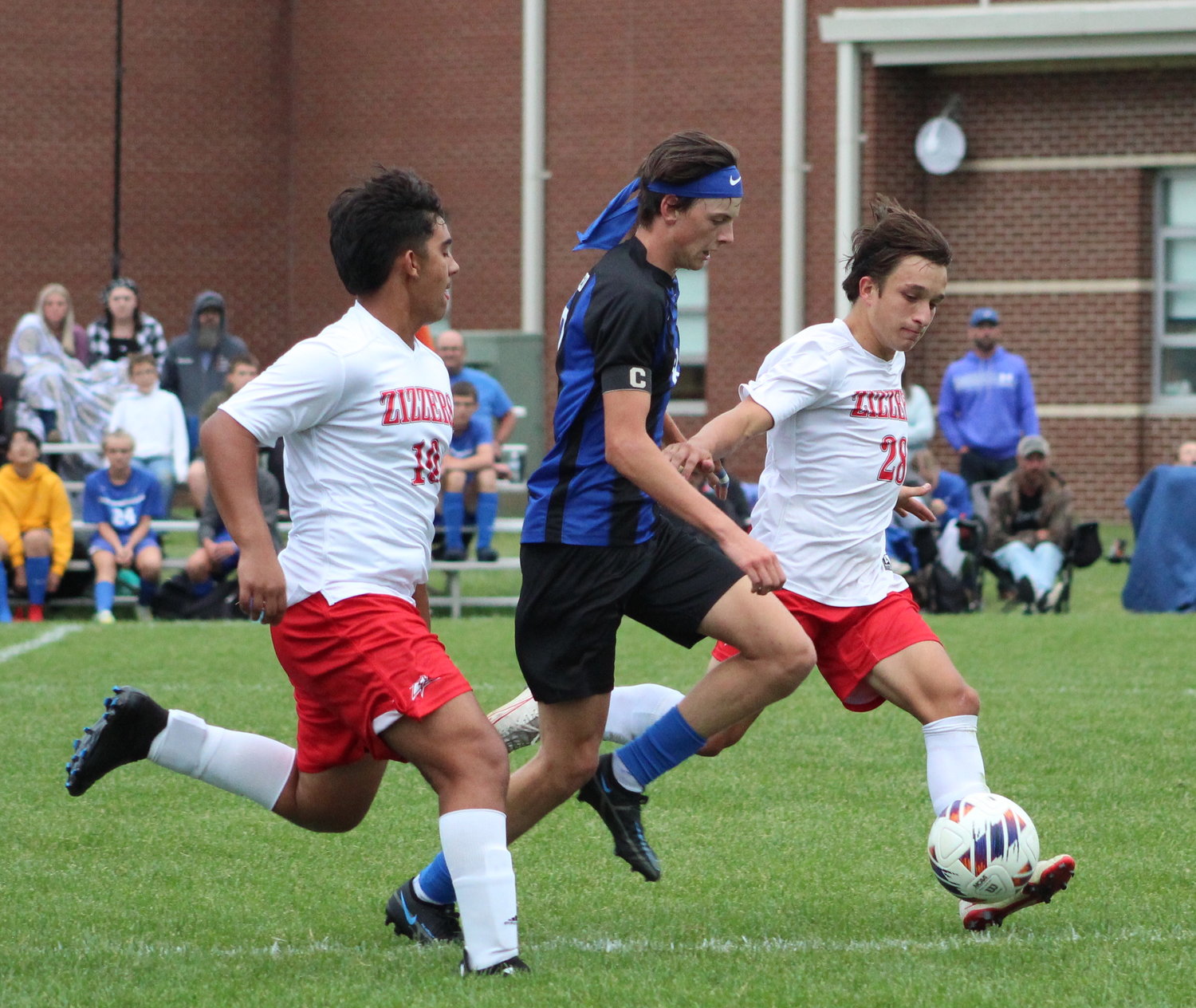 Hoping to score for the Bluejays is Senior #8 Asher Adams as he zips past the West Plains Zizzers.