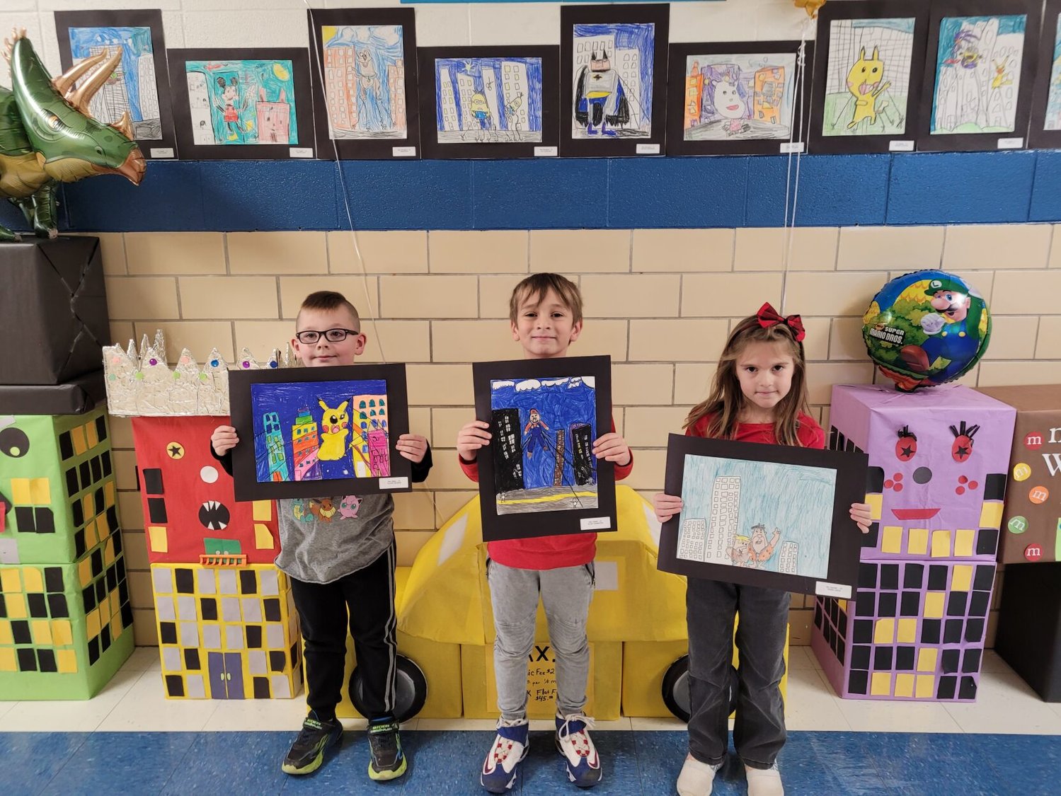 These first grades are just some of the many wonderful artists that contributed their floats to make Hubble's 2nd Annual Macy Thanksgiving parade a hit!


Mail Photos by John "J.T." Jones.