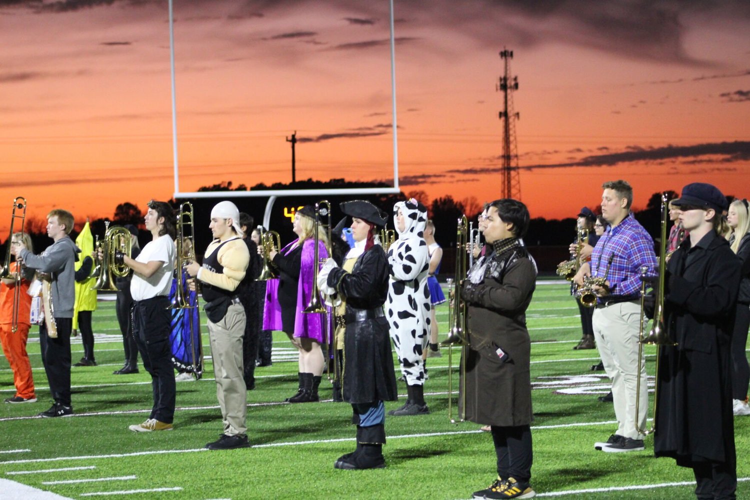 As the sunsets on that Friday night, the L-R Wildcat Marching Band prepares to pump up the crowd.


Mail Photo by John "J.T." Jones.