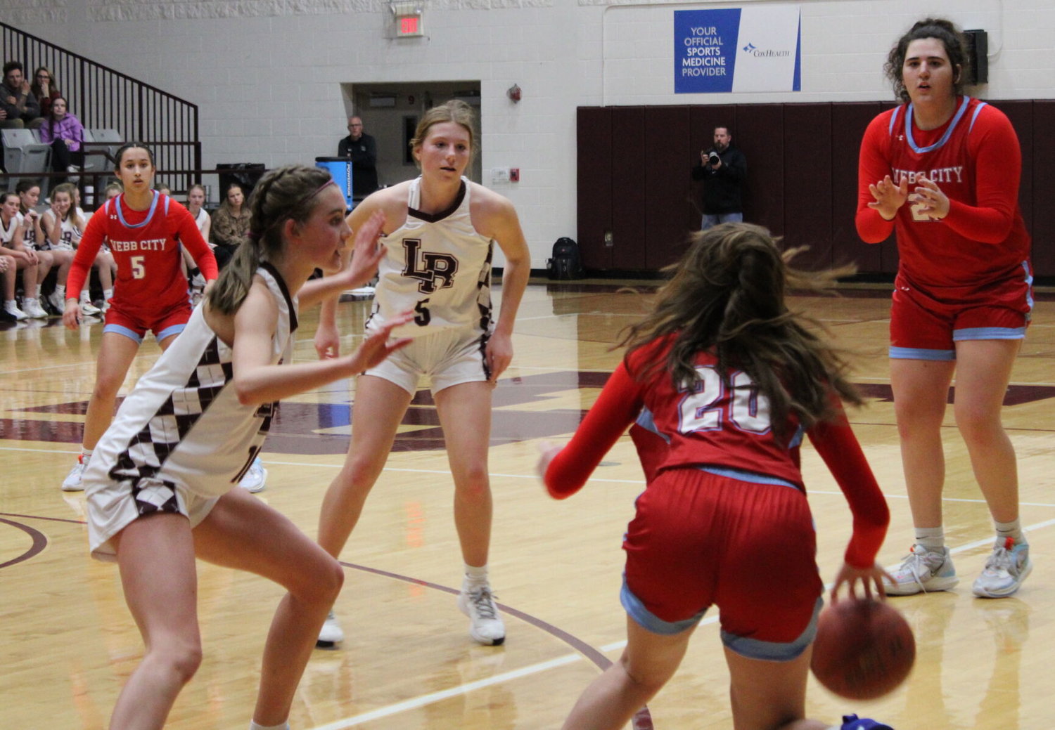 Playing defence are Freshmens Hailey Buckman and Sydney Prenger against Webb City. L-R would end up losing the game with the final score being 42-62. 