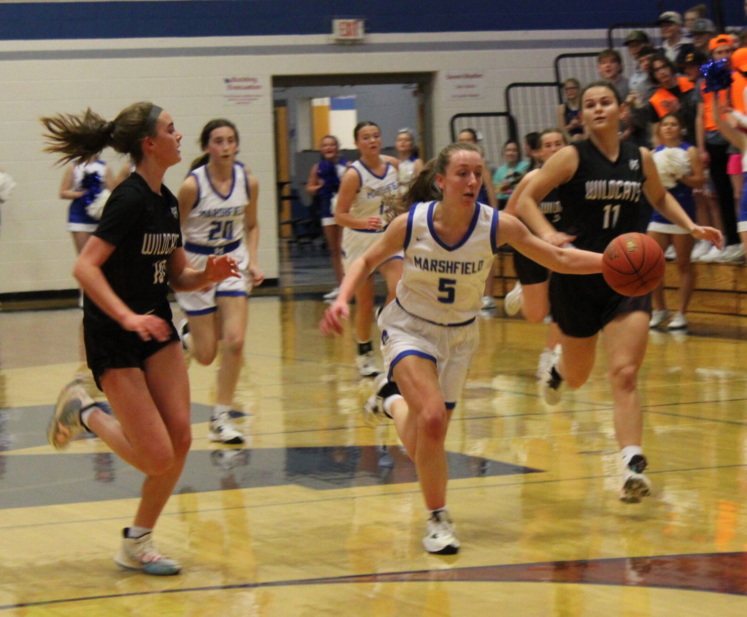 Pictured here dribbling down court for Marshfield is Junior Abby McBride.


Mail Photos by John "J.T." Jones.