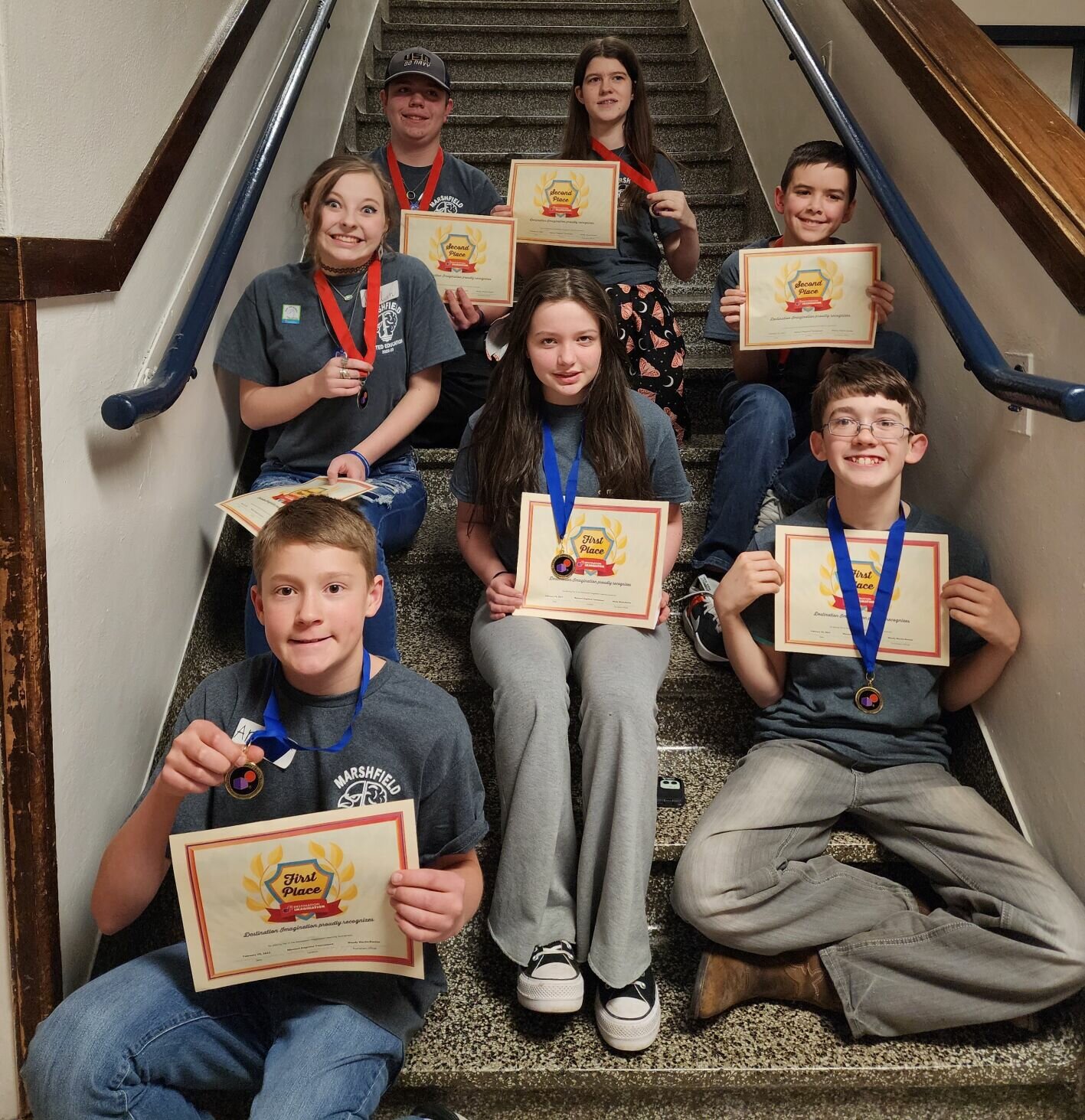 Both teams are pictured after winning first and second place in their respective division in the West Platte, MO, Regional Competition on Feb. 25.