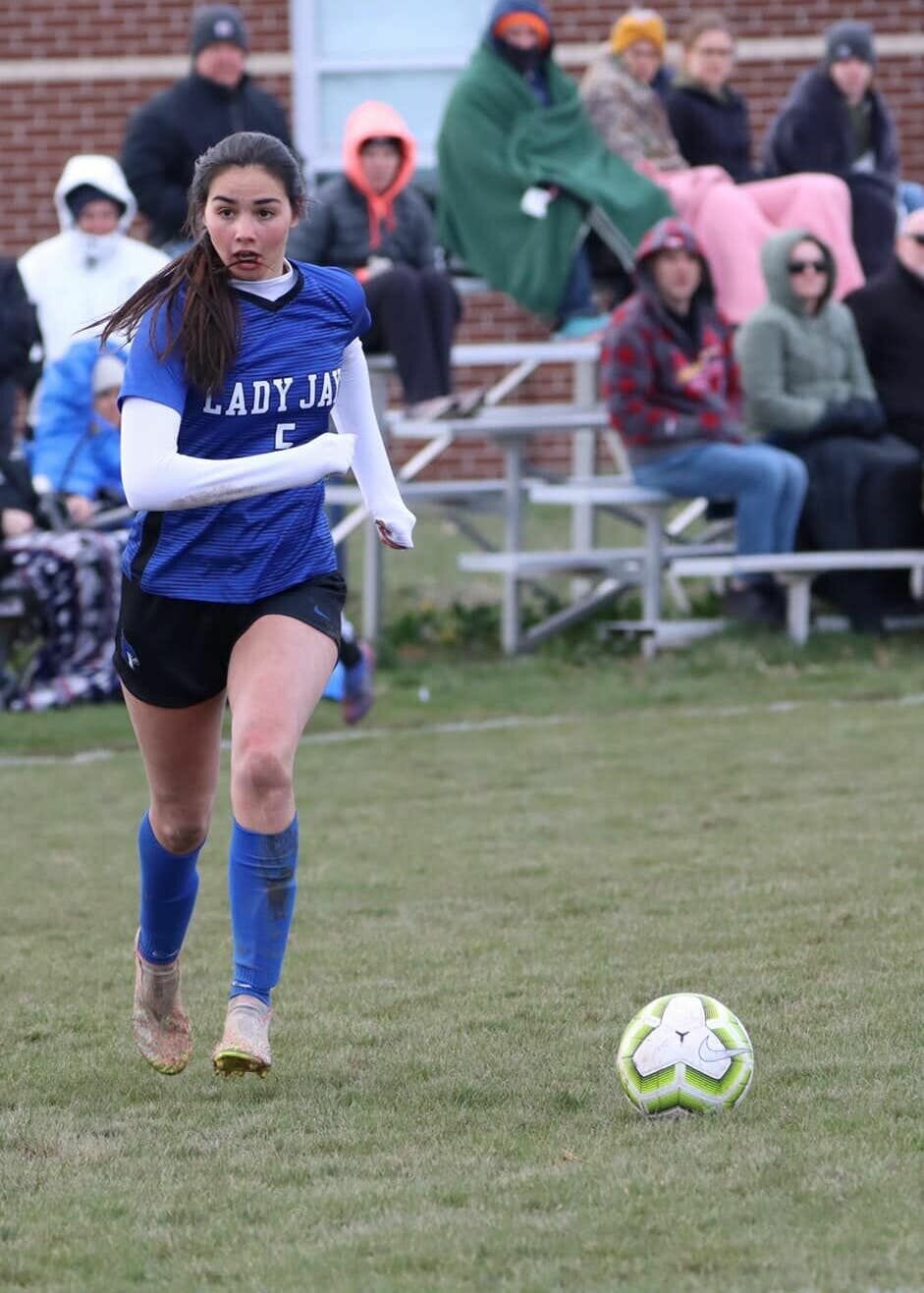 Junior Calli Watson, pictured kicking downfield, scored six goals for Marshfield against St. James on March 17.


Contributed Photos by Julie Manary