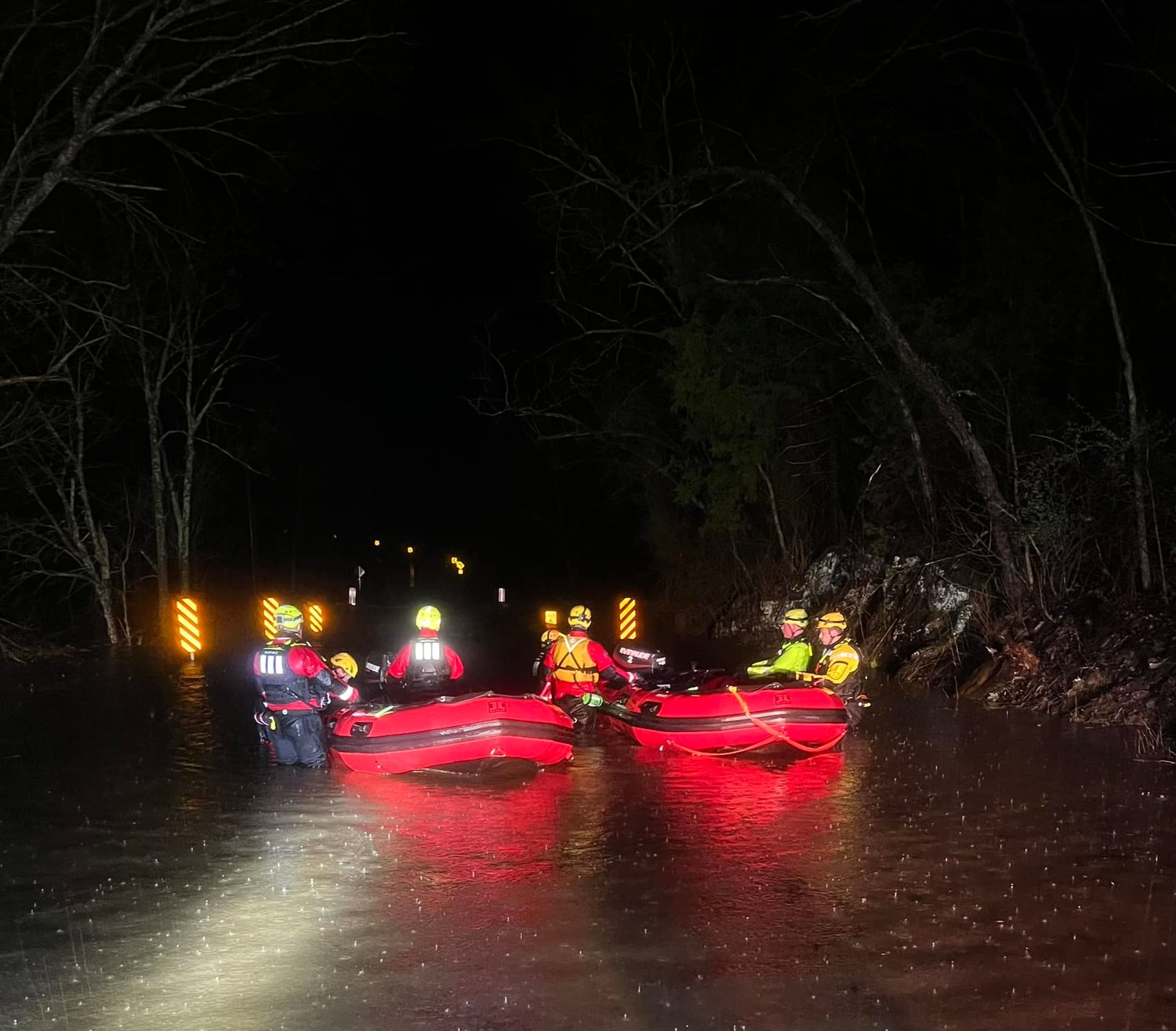 Water rescue teams from the Logan-Rogersville Fire Protection District and Battlefield Fire Protection District search for a missing woman on State Route Z Thursday night, March 23.