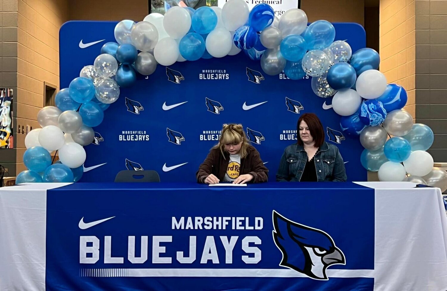 Sitting with her mom is Emily Cross as she signs her letter of intent to attend Ozarks Technical Community College through the Educators Pathway Program.


Contributed Photos by Marshfield High School
