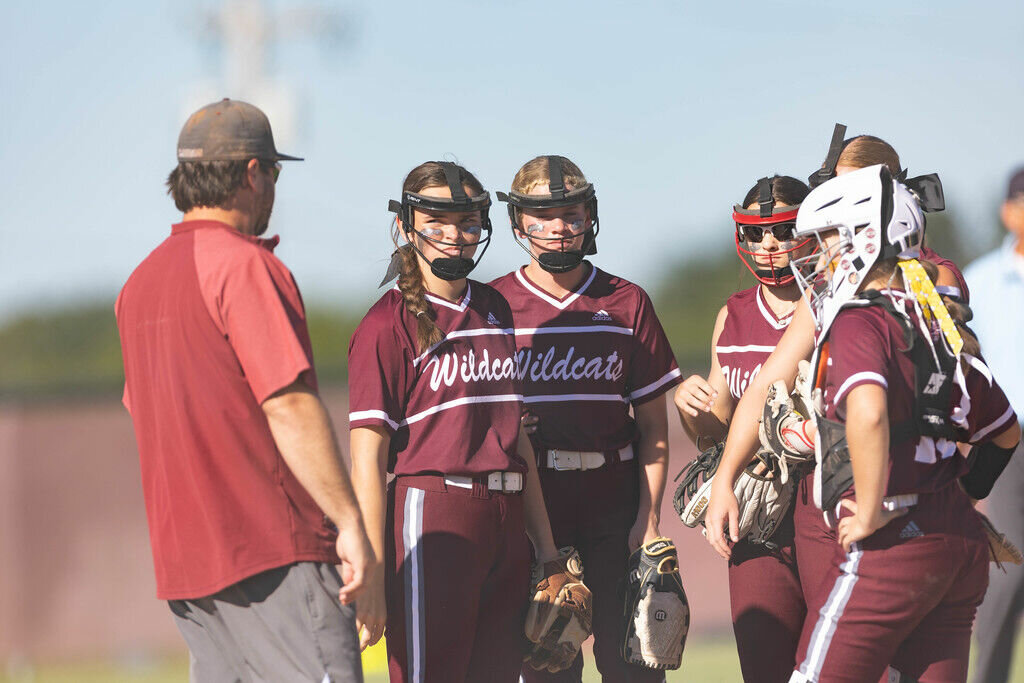 The Lady Wildcats meet with their coach, Manny Flores, at their game against Bolivar on Friday, Sept. 1.


Contributed photo from Greenbox Photography 