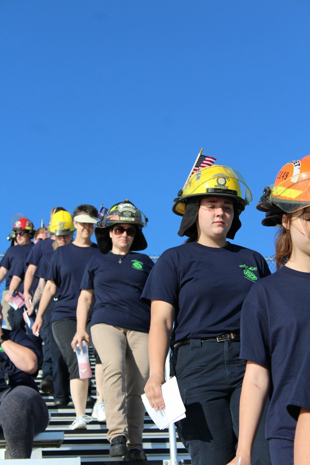 MFPD crews reflect in silence as they complete the stair climb in memory of firefighters who were unable to complete their mission 22 years ago.