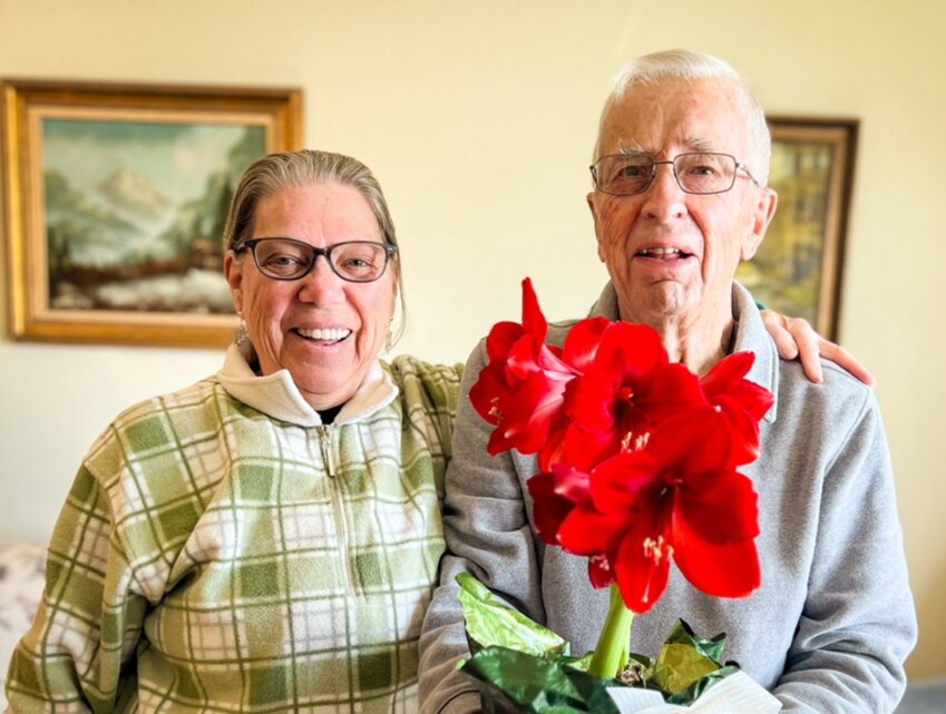 1302: Spencer Jenkins (right), who will be 96 on March 25th, 2025, received an amaryllis bulb from friend Sylvia Goede (left), before last Christmas. The bulb is now in full bloom.
