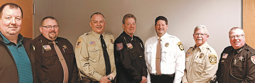 Pictured above, from the left, are WCMEG Coordinator – Investigator Rob Walensky, Jackson County Sheriff – Duane Waldera, Trempealeau County Sheriff – Brett Semingson, Crawford County Sheriff – Dale McCullick, La Crosse County Sheriff – John Siegel, Monroe County Sheriff – Wes Revels, and Vernon County Sheriff – Roy Torgerson. Together, the sheriffs make up the WCMEG Board of Directors. They have strength in numbers and funding, allowing for stronger and more aggressive actions against the criminal activities of the evil elements that seek to destroy communities and obliterate families.